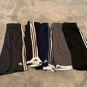 FIVE pairs of adidas gym shorts.